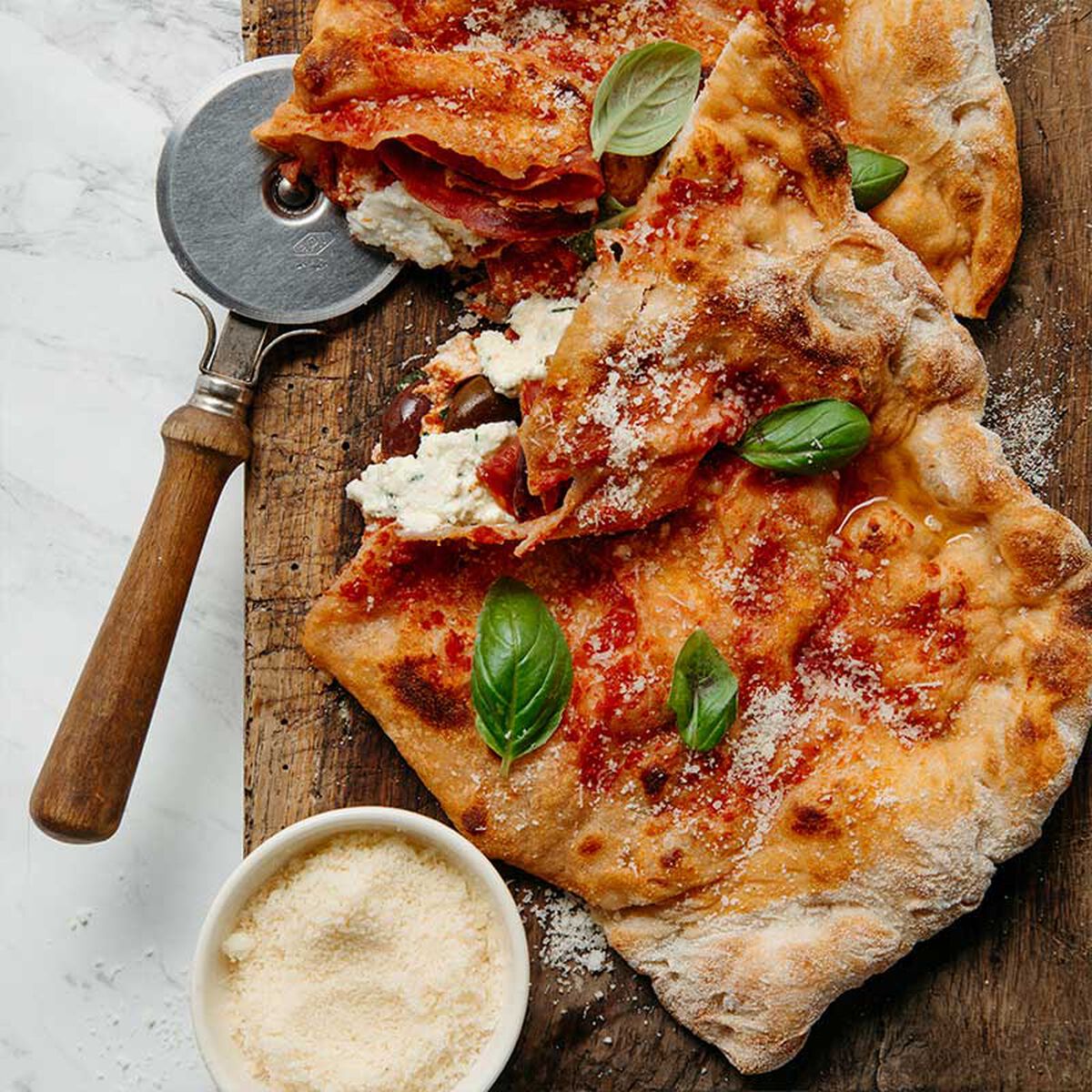 Salami, Ricotta, And Olive Calzone-1