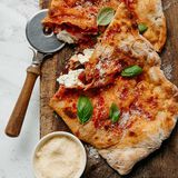 Salami, Ricotta, And Olive Calzone-1