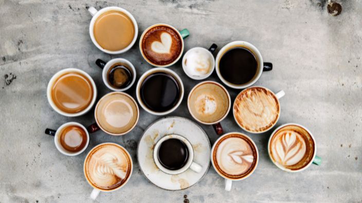 multiple coffee cups with coffee